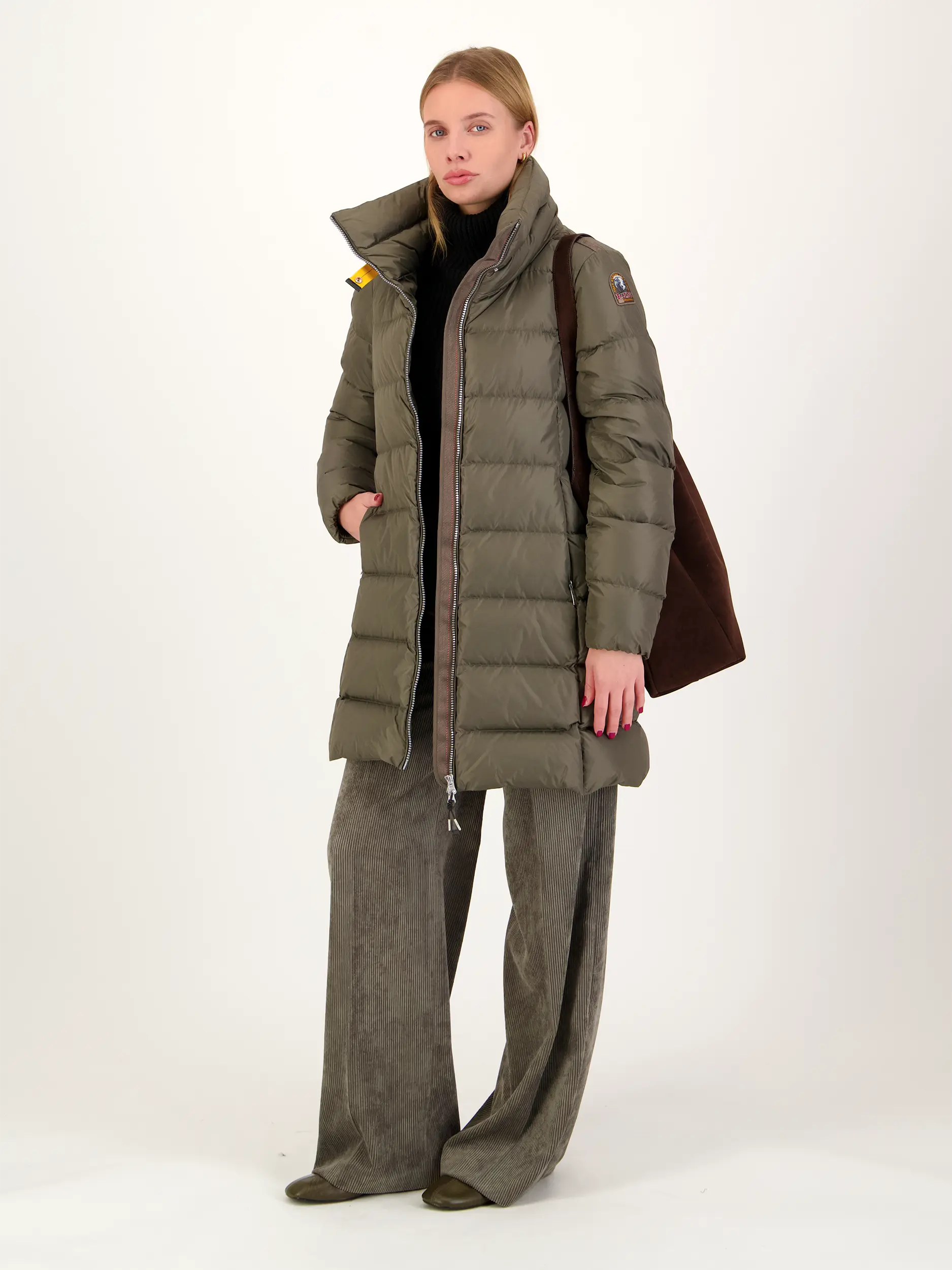 Wasserabweisende Steppjacke 'Malandra' - Artikel Teil eines Outfits getragen von einem Modell - Farbe: Grün