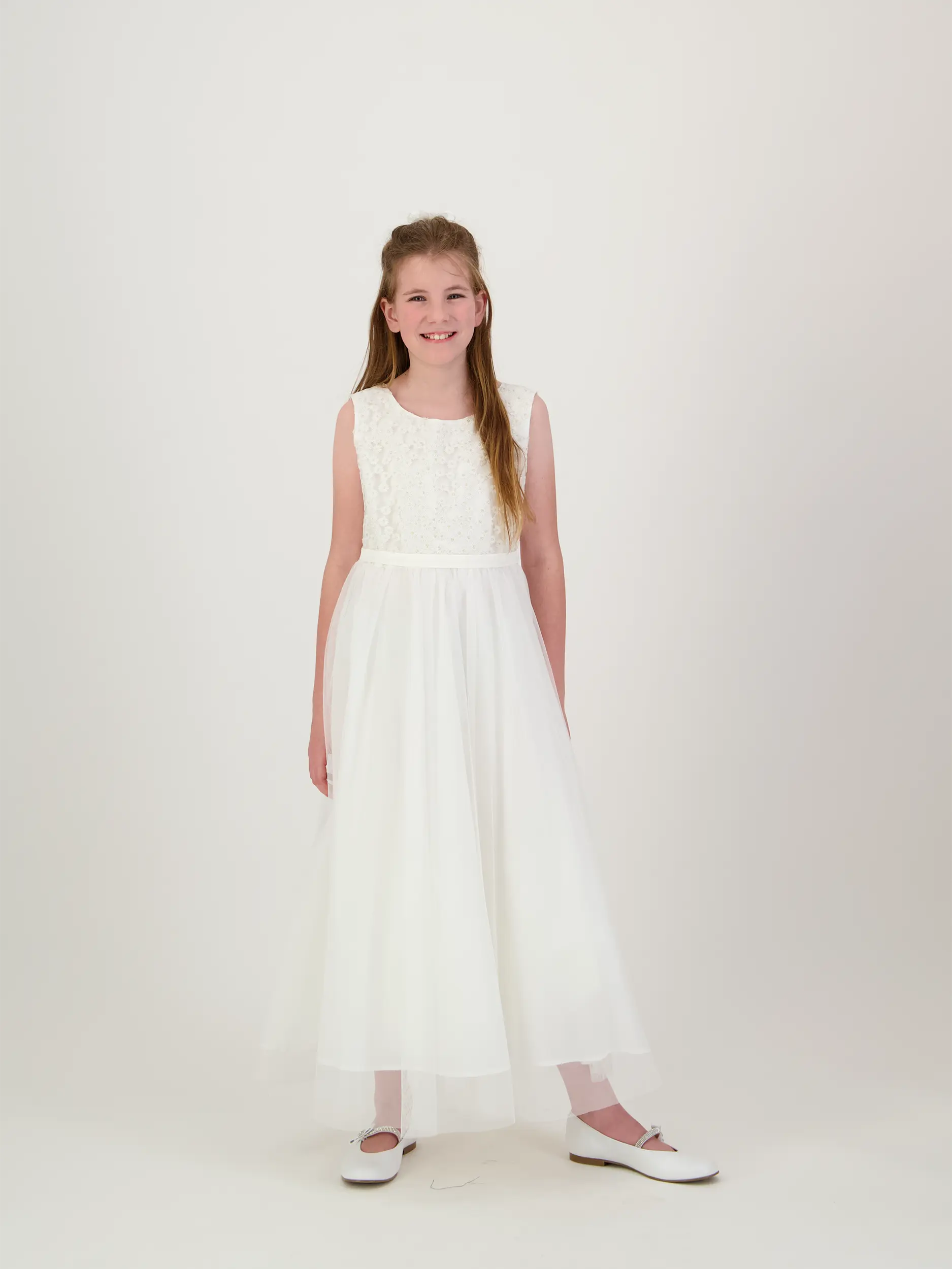 Mädchen Kommunionkleid  - Artikel Vorderseite getragen von einem Modell - Farbe: Creme