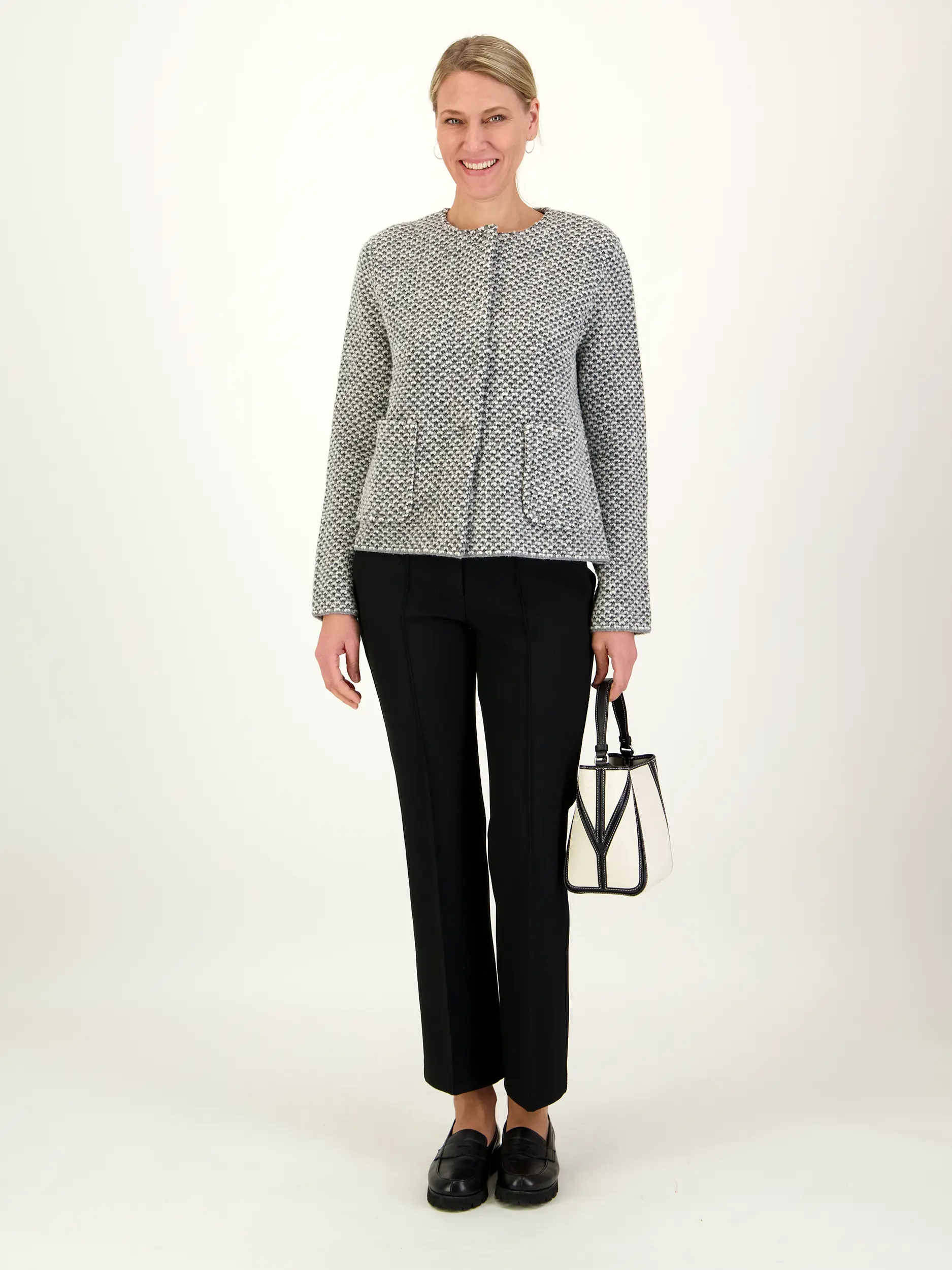 Wolljacke  - Artikel Teil eines Outfits getragen von einem Modell