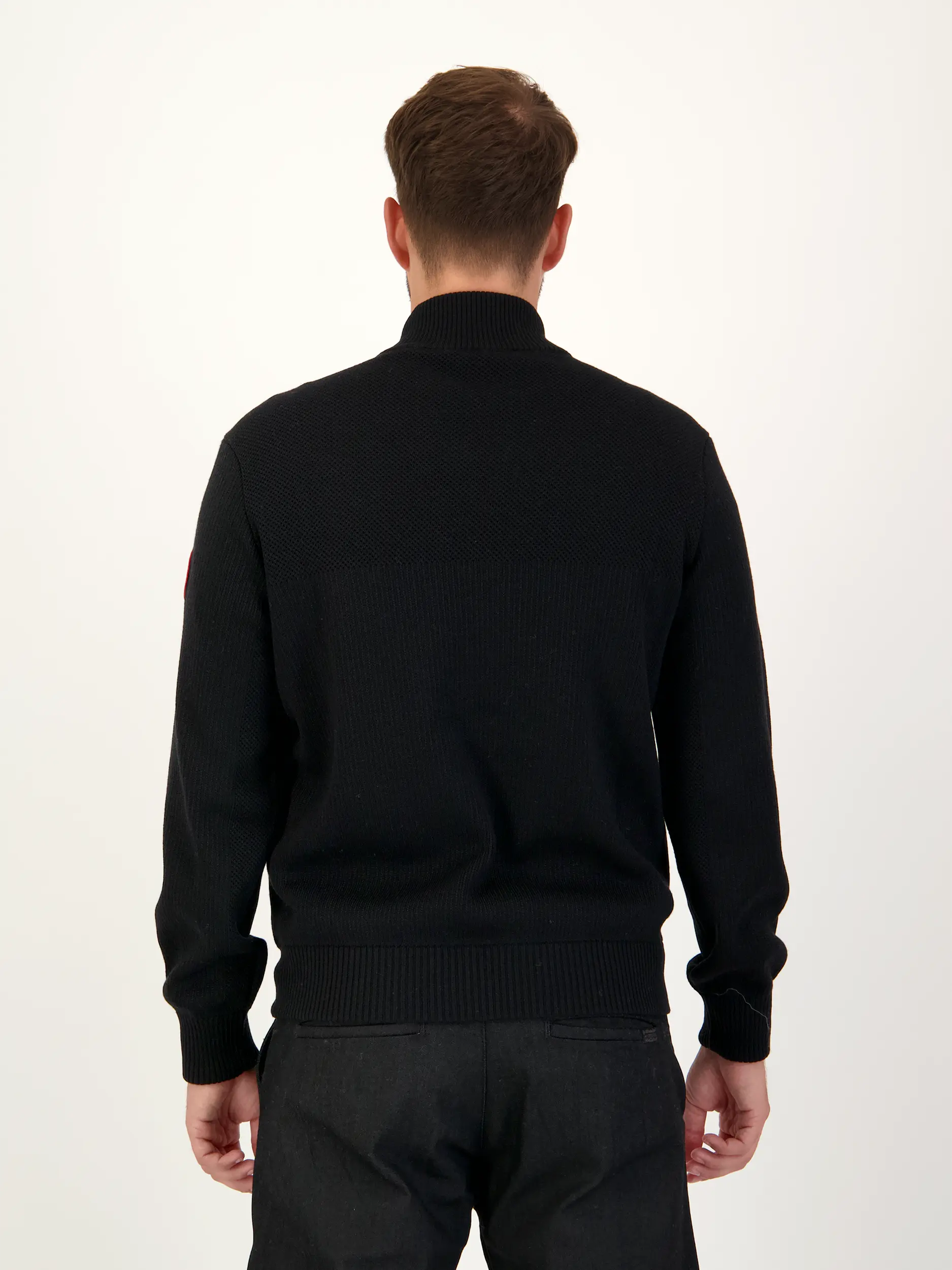 Jacke 'Hybridge' - Artikel Rückseite getragen von einem Modell - Farbe: Schwarz