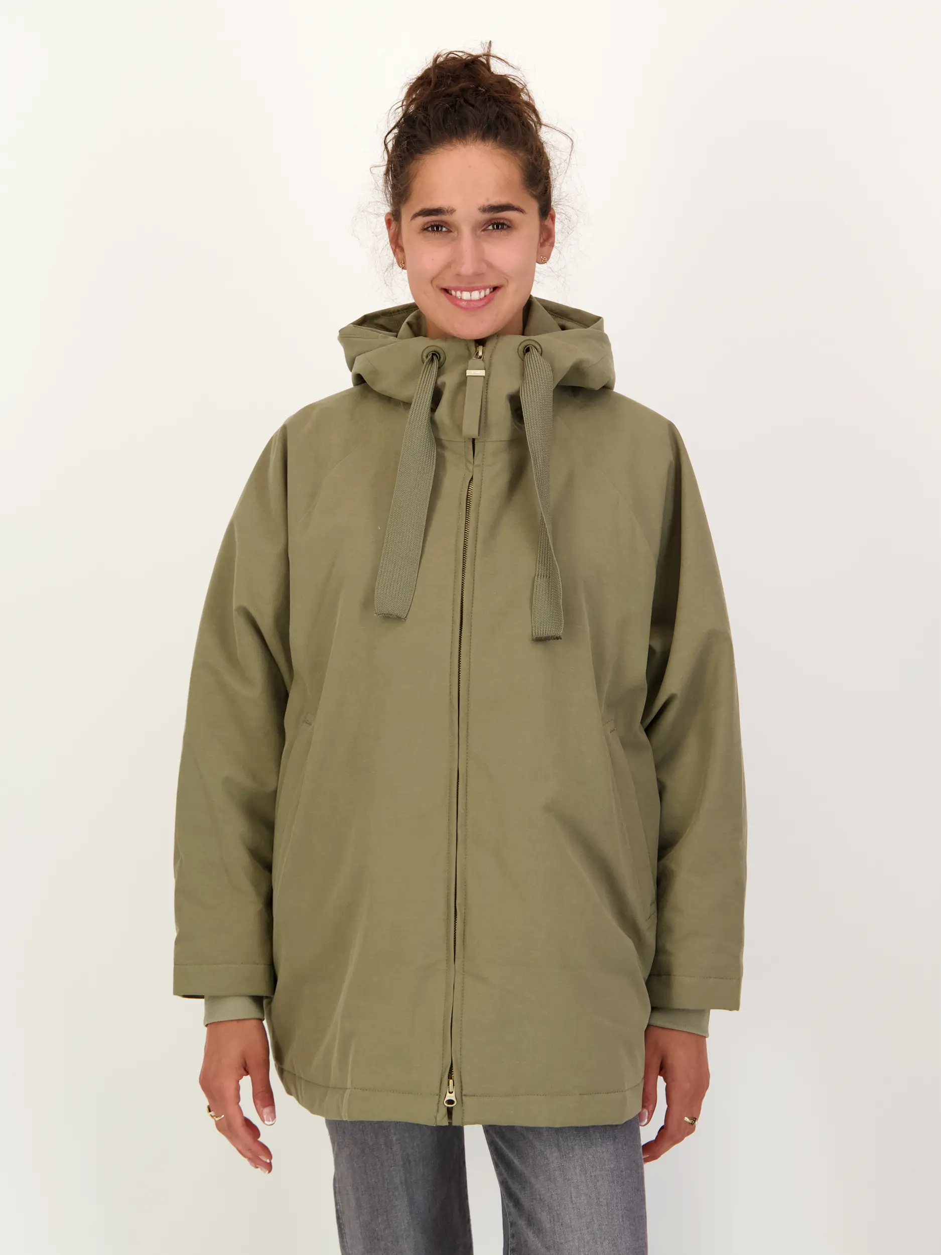 Wasserdichte Jacke 'Pure' - Artikel Vorderseite getragen von einem Modell - Farbe: Grün